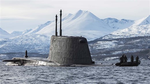 Royal Marines launch stealth raid from submarine during Arctic drill