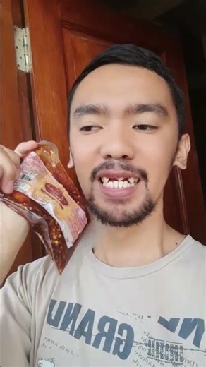 Eating dim sum dipped in chili oil is delicious