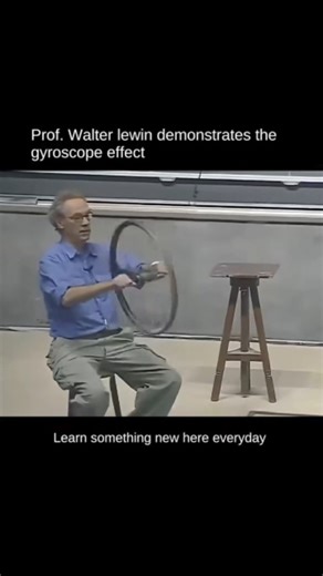 Science • History • Nature Facts on Instagram: "Physics is WILD! 🤯 Watch Professor Lewin demonstrate the incredible Gyroscopic Effect right in the middle of a lecture. The spinning wheel wants to maintain its orientation in space, which is why when he tries to twist it (apply a torque), it moves in a completely different direction (precession)! This is the same physics that keeps your bicycle upright and stabilizes satellites in space! If you want the secret sauce behind how it works, check out