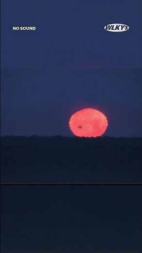 Full flower moon setting over Floyds Knobs ahead of Kentucky Oaks