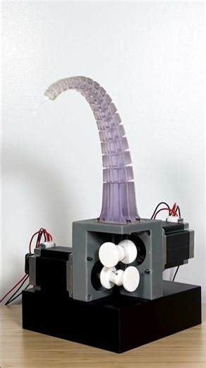 Octopus Robot Arm Grips Water Glass