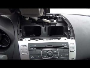 Installation of the Aux adapter accessory kit and disassembly of the car radio