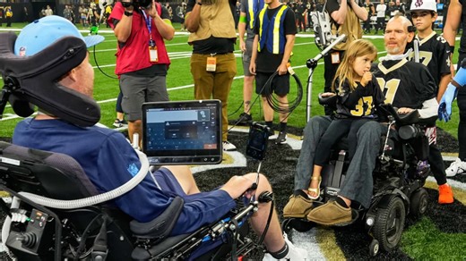 Honorary captains Steve Gleason & Tim Shaw meet at mid-field before Saints vs. Titans 2023 season opener