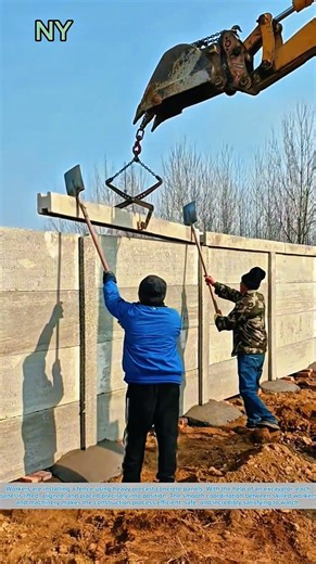 Installing Precast Concrete Fence Panels with Excavator Precision.