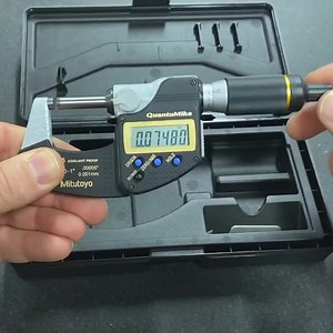 Checking a Diameter on an Aerospace Part with one of our favorite OD Micrometers | Titans of CNC Machining