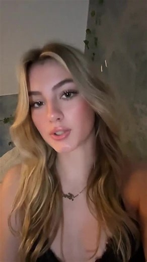 I hang a new curtain in my bedroom, adjusting the rods carefully, and wishing someone would help me hem the bottom so it fits just right.