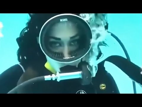 Female Diver is Diving with Body Glove Neoprene Wetsuit