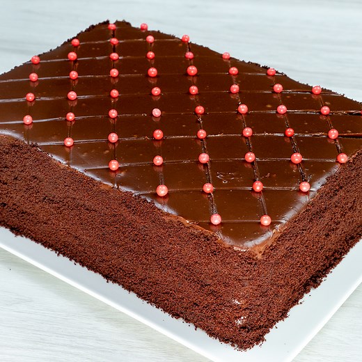 I taught all my friends how to make the fastest chocolate cake! Ingredients: eggs: 4 pc powdered sugar: 250 g (8.8 oz) oil: 150 ml (5.1 fl oz) milk: 400 ml (14 fl oz) flour: 500 g (18 oz) cocoa: 80 g (2.8 oz) baking powder: 12 g (0.4 oz) sodium bicarbonate: 5 g (0.2 oz) lemon juice: 15 ml (0.5 fl oz) dark chocolate: 30 g (1.1 oz) hot milk: 150 ml (5.1 fl oz) condensed milk: 20 g (0.7 oz) colorful candies: 20 g (0.7 oz) The cream: condensed milk: 350 g (12 oz) dark chocolate: 200 g (7.1 oz) whipp