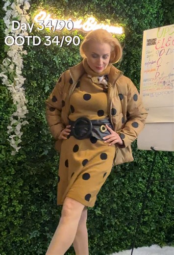 OOTD 34/90 – Hack 7: When the Dress and Jacket Match… interrupt the symmetry. It was a rainy day ten years ago. @target The brand? Who What Wear. @whowhatwear The question at checkout: “Why am I doing this?” The answer a decade later: “Because future me runs challenges.” The risk with matching dress puffer is visual monotony. The solution? Interrupt the pattern. You added a pleather belt (gifted) to create a waist break. A $5 scarf to introduce movement. Layered brooches from a yard sale ($3–4 r