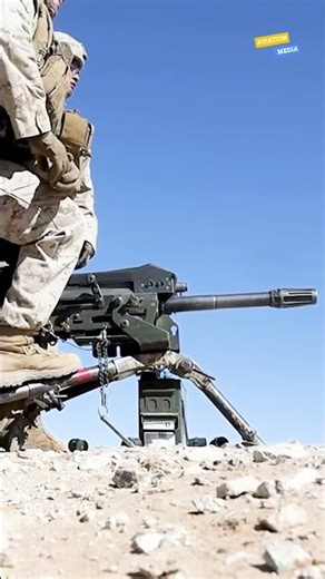 US Marines fire a Mark 19 40mm grenade launcher.