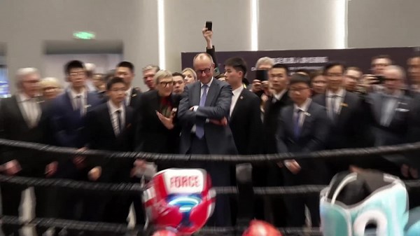 German chancellor ends trip to China by attending robot boxing match