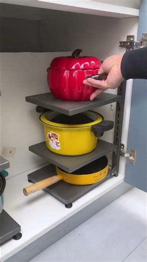 This multi-tiered pot rack is perfect for kitchen storage. Made of carbon steel, it's sturdy