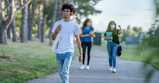 Amid college virus outbreaks, should students stay on campus or head home?