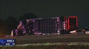 UPS truck crash scatters packages on I-30
