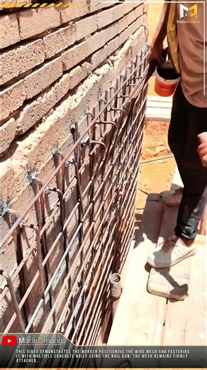Worker Process Installs Wire Mesh Using Powder Actuated Nail Gun
