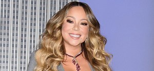 Mariah Carey Stuns In A Red Bodysuit For Rooftop Performance