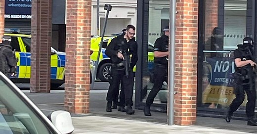 Armed police in Grimsby surround Freeman Street YMCA