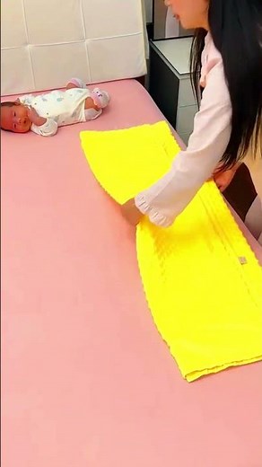Quick Newborn Swaddle: Steps for a Toasty Baby#newbornswaddle #sleepingbaby #howtoswaddle #babywrap