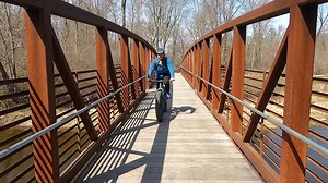 1.4K views · 205 reactions | Nick and Andy bike through Mt. Pleasant Michigan along the Chippewa River on the GKB Riverwalk Trail and decide to stop and play a game of pickleball before burgers at Freddie's Tavern. | MI Playground | Facebook