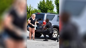 'Surprise of her life': Police officer pulls girlfriend over in traffic stop to propose