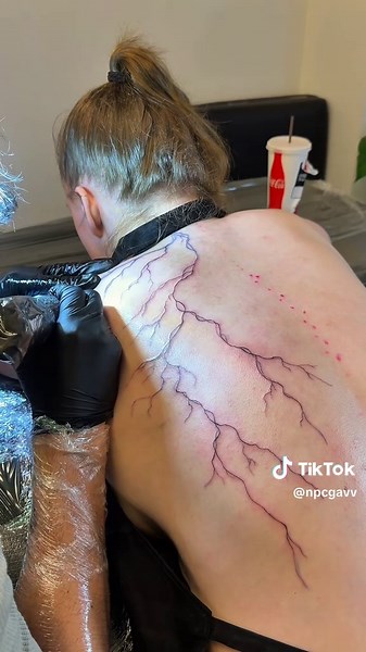 Large-scale lightning tattoo process by Seattle tattoo artist