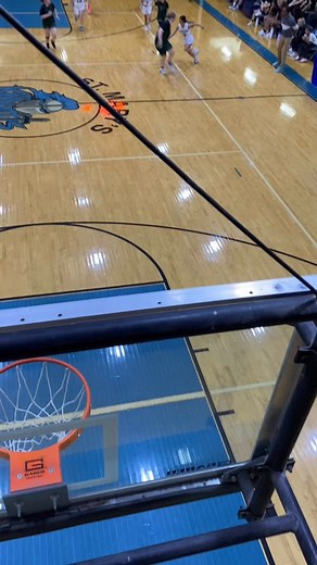Daisy Rodriguez splits the defenders for a layup during last week’s St. Mary’s Lady Knights win over Poetry Christian. | Bob Ward