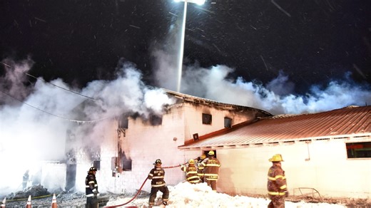 Firefighters fight stockyard auction blaze in freezing temps