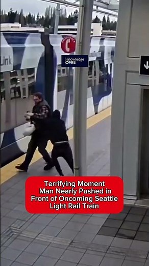 Man was nearly pushed onto the tracks just as a train arrived.