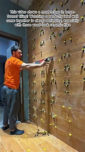 Perfectly Level: Wood-Look Wall Tiling with Leveling System #Tiling #HomeRenovation #InteriorDesign