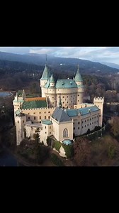 Bojnice Castle, located in Bojnice, Slovakia, is a romantic 12th-century medieval castle renowned for its fairy-tale appearance, blending Romanesque, Gothic, and Renaissance elements. Rebuilt in the late 19th century by Count Ján Pálffy in a neo-Gothic style inspired by French Loire Valley châteaux, it features ornate interiors, a 14th-century Florentine altar, and a travertine cave with a 26-meter-deep well. One of Slovakia’s most visited sites, it hosts the International Festival of Ghosts and