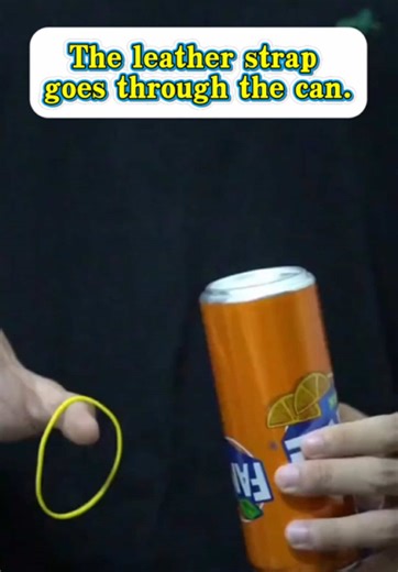 The leather strap goes through the can. #magic