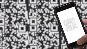 QR CODE look alike black and white pattern (CAN NOT SCAN THIS) and SMARTPHONE. Image of scanning QR CODE. Blurred moving black and white pattern background.
