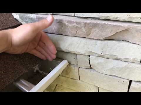 Missing Kickout Flashing on Manufactured Stone Veneer Causes Damage in the Wall Below.