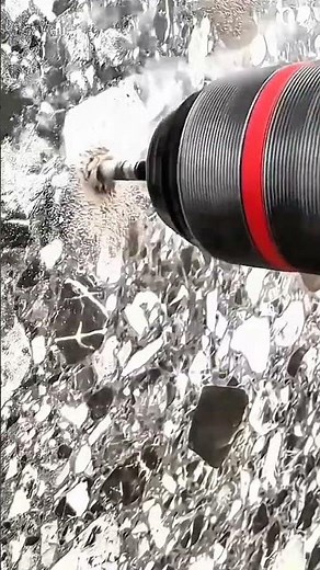 Cleaning rusty bolt threads using rotating wire brush