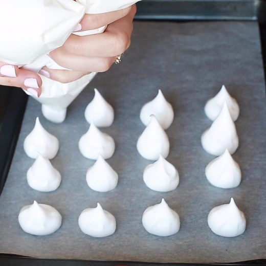 Learn how to make the best light and crispy Vegan Meringue kisses with whipped up aquafaba - only four ingredients needed to make these egg free, melt-in-your-mouth cookies! RECIPE >> https://www.asaucykitchen.com/vegan-meringue-aquafaba/ | A Saucy Kitchen - Gluten Free Recipes