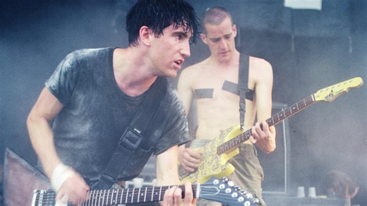 Nine Inch Nails made their name with infamously destructive live shows – this is the true story behind their epic guitar smash-a-thons