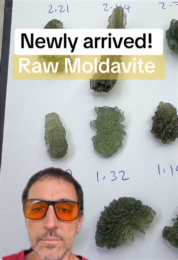 These are some gorgeous new Moldavite specimens that have just arrived today. These are reasonably small and very affordable but absolutely beautiful as you will see. I have priced them about 30% less than I normally would because I’ve saved many hours in photographing them individually multiple times and then editing them. Instead I’ve taken one photo and include the weight and description, and hearing in this video you can get it very good look at each one to determine which one you might like