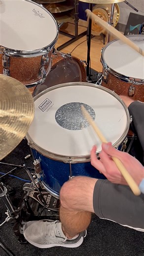 1960s Ludwig Transition Badge Marching #snaredrum Straight out of the golden age of American drum craftsmanship, this Ludwig marching snare wears the iconic Transition Badge. Featuring beautifully aged nickel hardware and blue sparkle wrap, classic Ludwig lugs, and that unmistakable warm, resonant tone, this drum was built to project over a marching band but sings just as sweetly in a studio or #vintagedrums collection. #snaredrum #rudimentaldrumming #strajkstudios | Strajk Studios