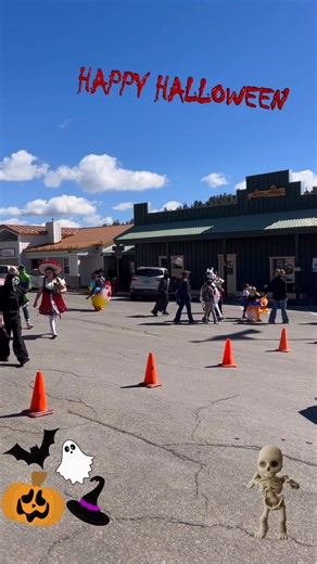 Spooky kids making their way down Burro Avenue at the 2025 Fall Festival Costume Parade | Village of Cloudcroft