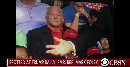 Ex-congressman Mark Foley sits behind Trump at rally