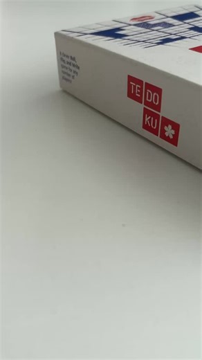 TEDOKU is a clever and addictive “roll, flip, and write” game, that combines the logical satisfaction of Sudoku with the spatial challenges of polyomino puzzles. Designed for any number of players, TEDOKU can be played solo or as a group, as long as each player has a pencil and their own sheet. Each player has a 9x9 grid inspired by Sudoku, and over 20 rounds, they’ll fill it using dice rolls and card draws. At the start of each round, one card is flipped and the TEDOKU die is rolled. The card d