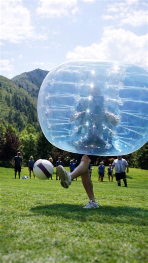 Playing soccer inside giant zorbs