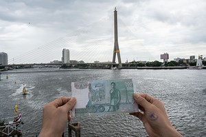On the back side of the 20 Thai Baht banknote issued in 2003, there is a magnificent cable-stayed bridge - the Rama VIII Bridge built with the participation of Chinese enterprises.In Bangkok, throughout the day and night, countless visitors come to capture the beauty of the Rama VIII Bridge, for it is not only a prominent transportation route of the city but also a popular recreational area. As the night closed in, the golden lights on the bridge and the illuminated buildings around it compose a