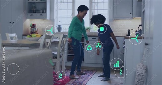 Mom guiding son stepping on rug in kitchen, sparking round edu icons around feet, training steps