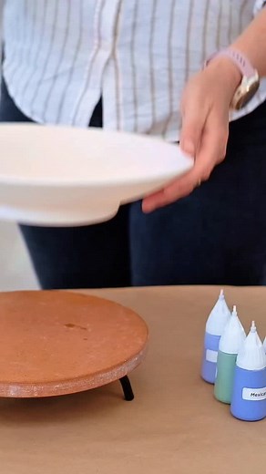 Round and round you go! Spin the banding wheel and create fun circular and spiral patterns—each one a unique work of art with its own twist! #claycafegeorge #ceramicpainting #ceramics #painteatplayrepeat #gardenroute #ceramicslovers #letsgetcreative #ceramicpaintingtechniques #creativefun #bandingwheel | Clay Cafe George