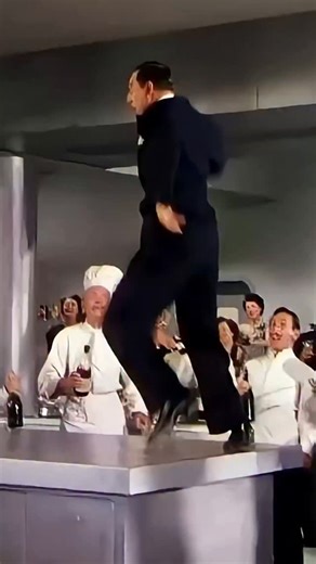 hollywoodflashback on Instagram: "In 1952, Hollywood witnessed one of its most unexpected and surreal dance performances—and most people still don’t talk about it. This short clip comes from April in Paris, featuring the legendary Ray Bolger—the same man audiences adored as the Scarecrow in The Wizard of Oz. But here, Ray Bolger delivers something completely different. Instead of elegant ballet or traditional tap, Bolger performs a quirky, elastic, almost cartoon-like dance that looks decades ah