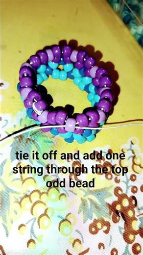 how to make a kandi rotator cuff tutorial! #fypシ゚viral #viralmusic #kandi #scenecore #kandikid #yay