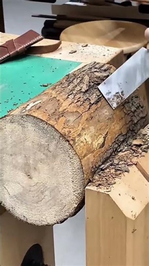 Peeling and Shaping Wood Logs with a Manual Drawknife for Professional Building Construction