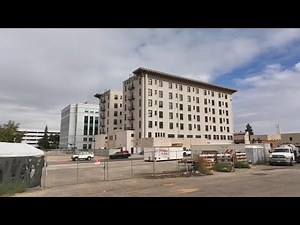 A look inside Hotel Fresno as people enter a lottery for apartment units