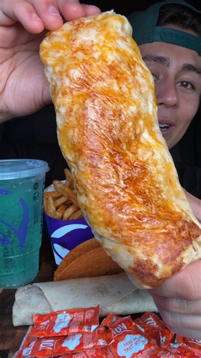 Grilled cheese burrito w/ extra everything is a must 🌮🔔💜🌯@tacobell #mukbang #foodasmr #foodie #foryouuuuuu #tacobell